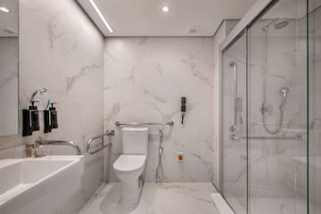 a bathroom with a toilet and sink