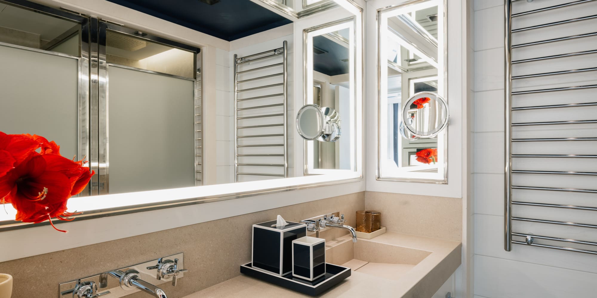 a bathroom with a mirror and sink
