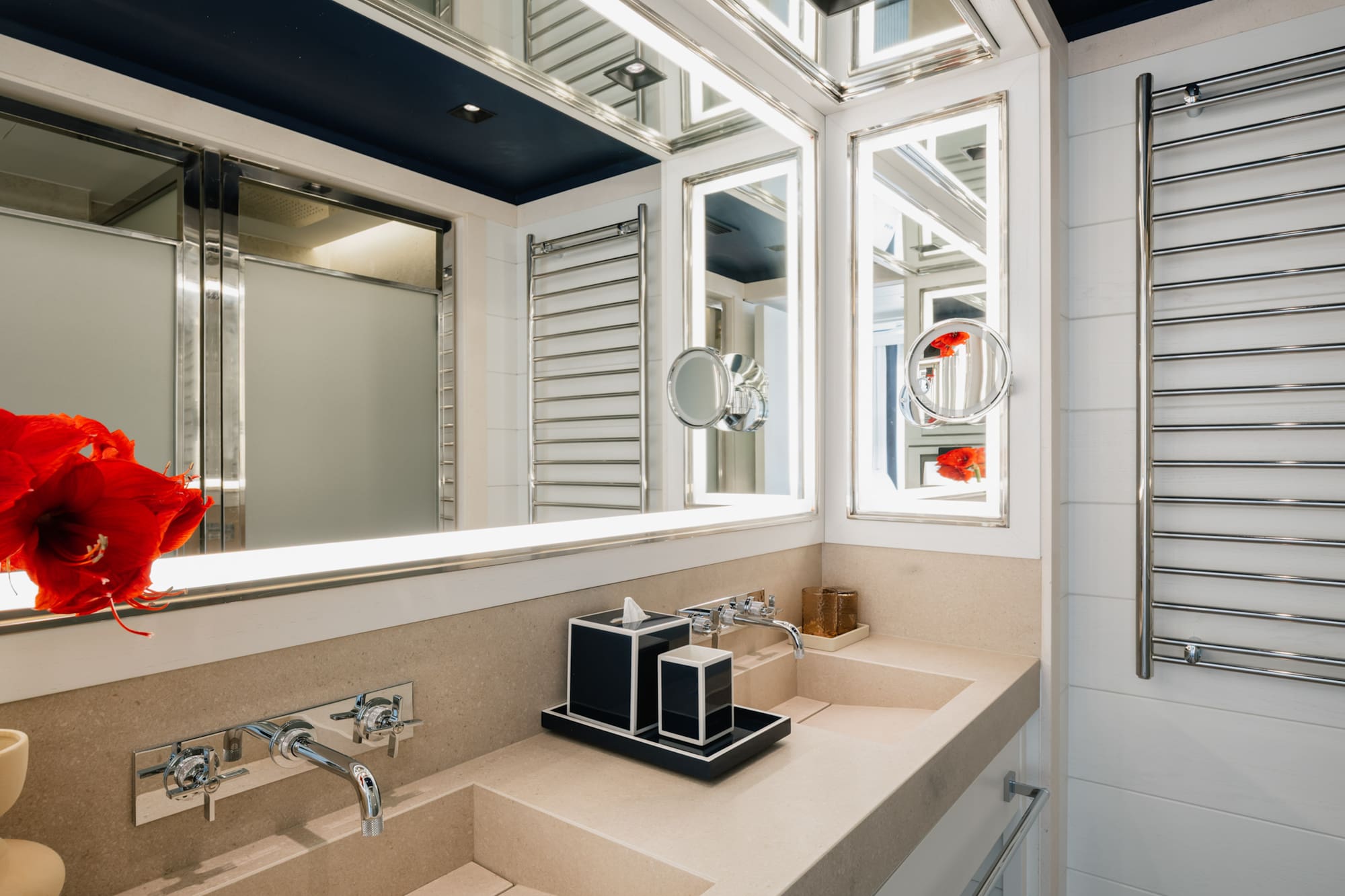 a bathroom with a mirror and sink