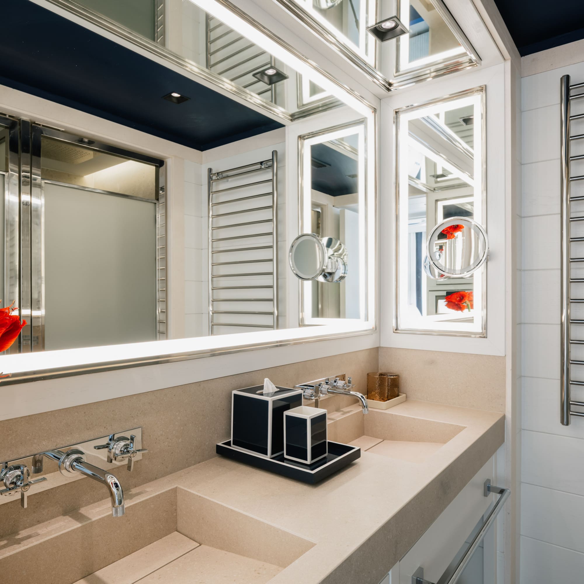 a bathroom with a mirror and sink