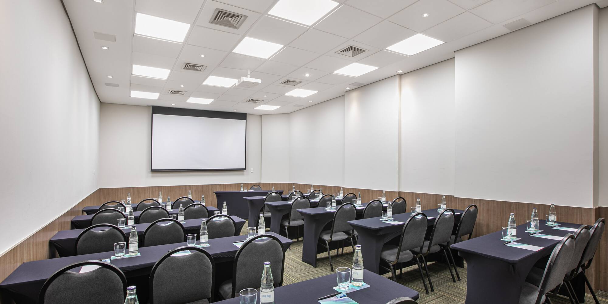 a room with tables and chairs