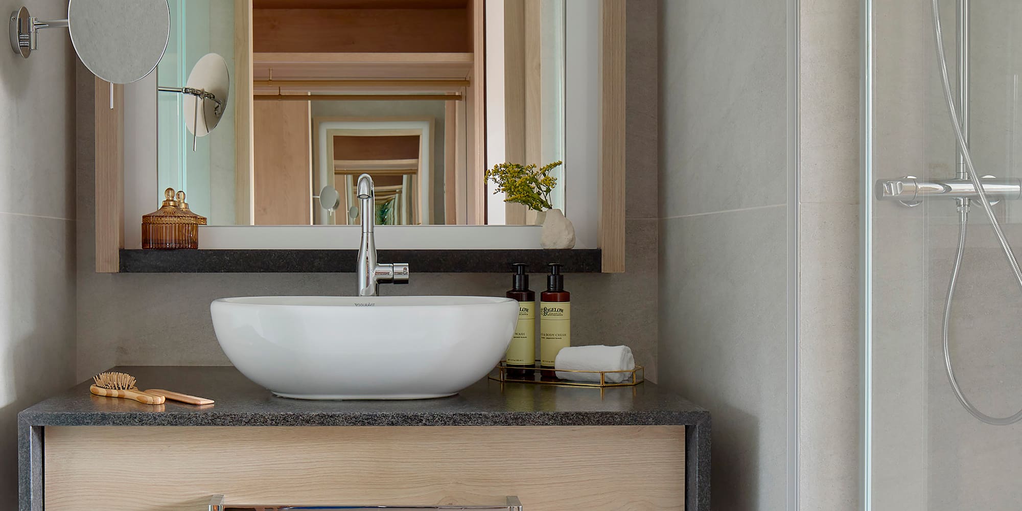a bathroom sink with a mirror