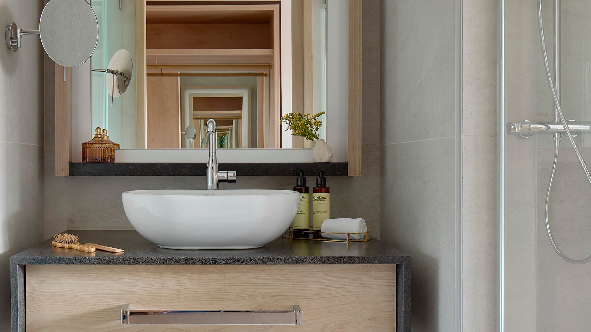 a bathroom sink with a mirror