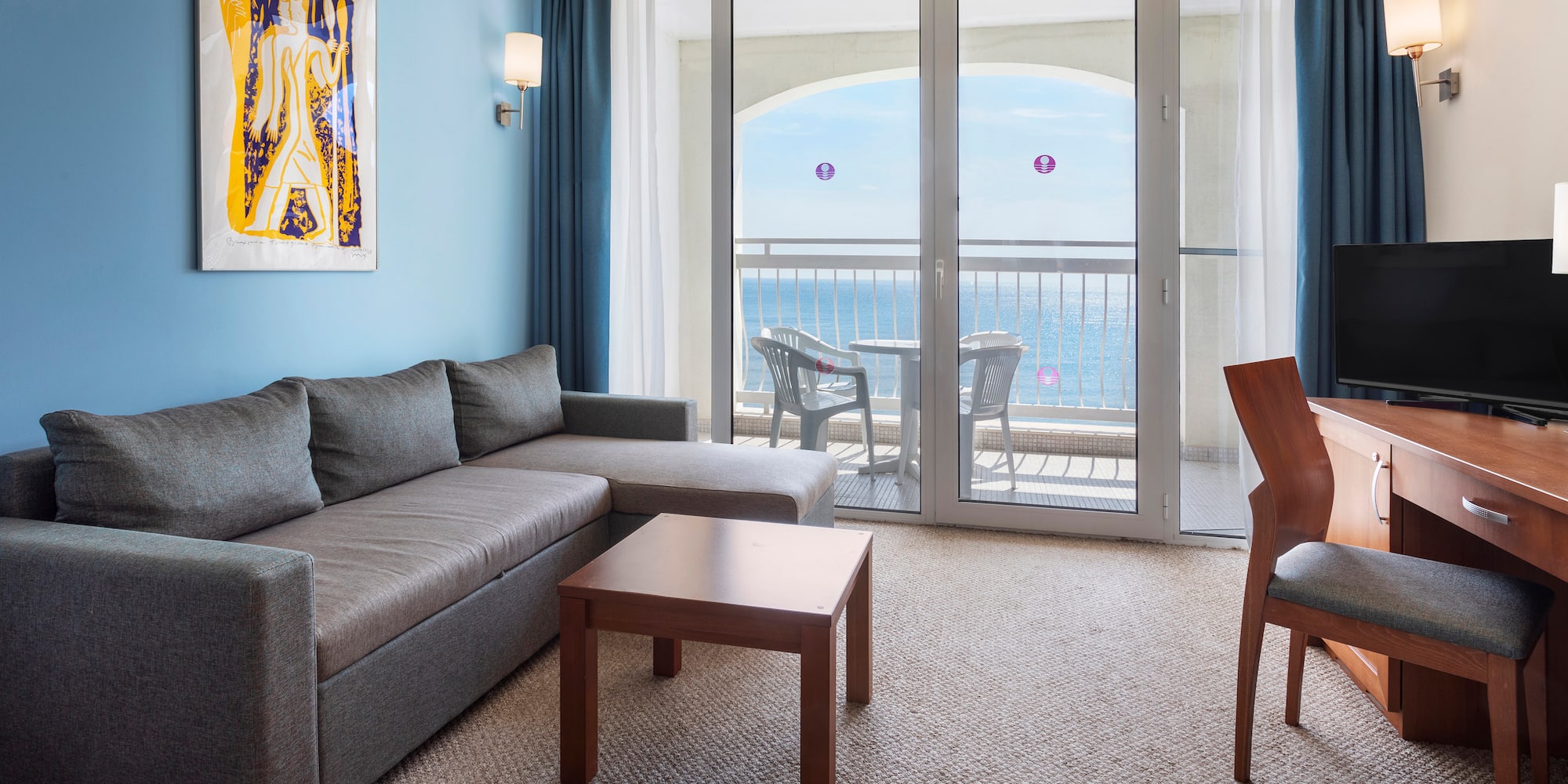 a living room with a couch and a table