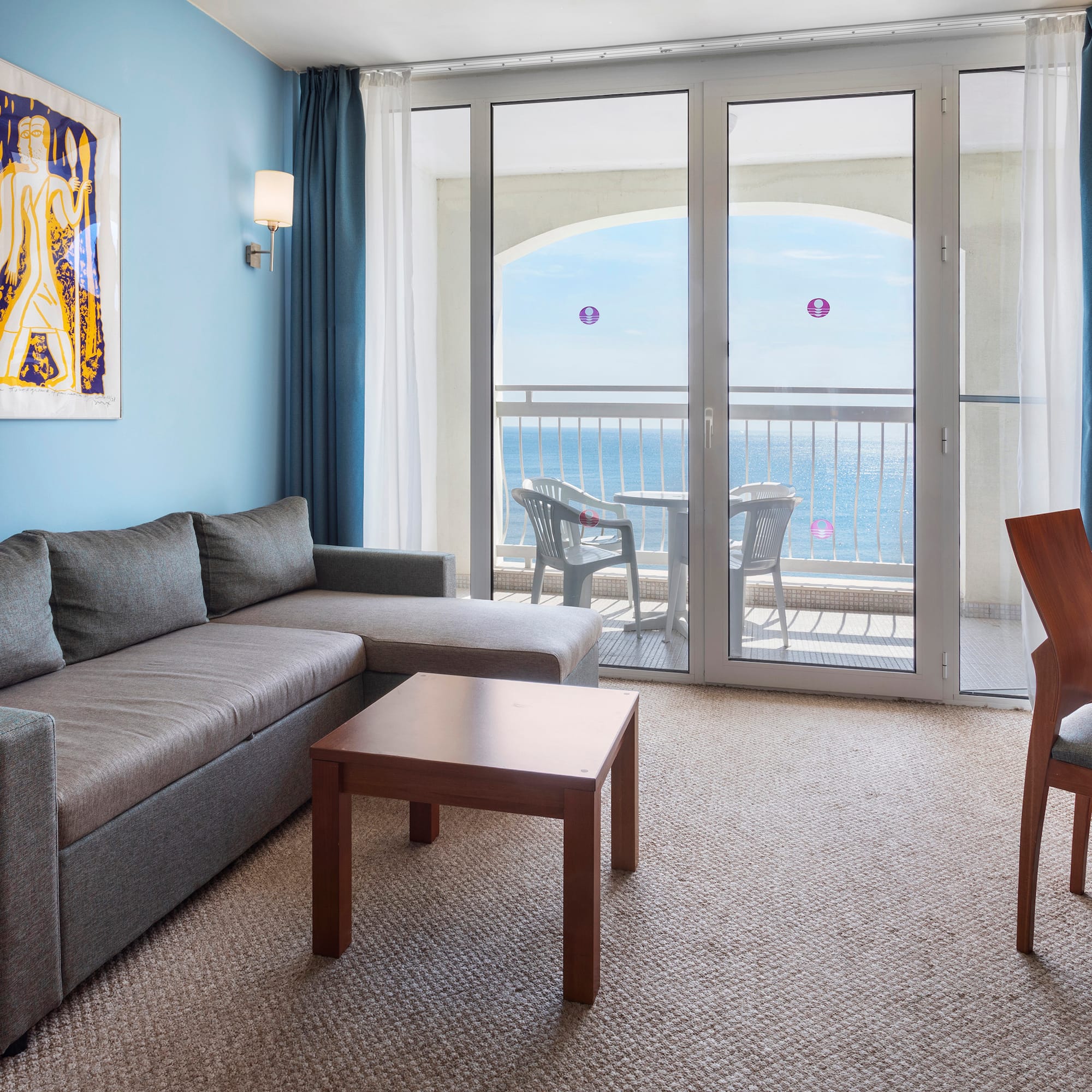 a living room with a couch and a table