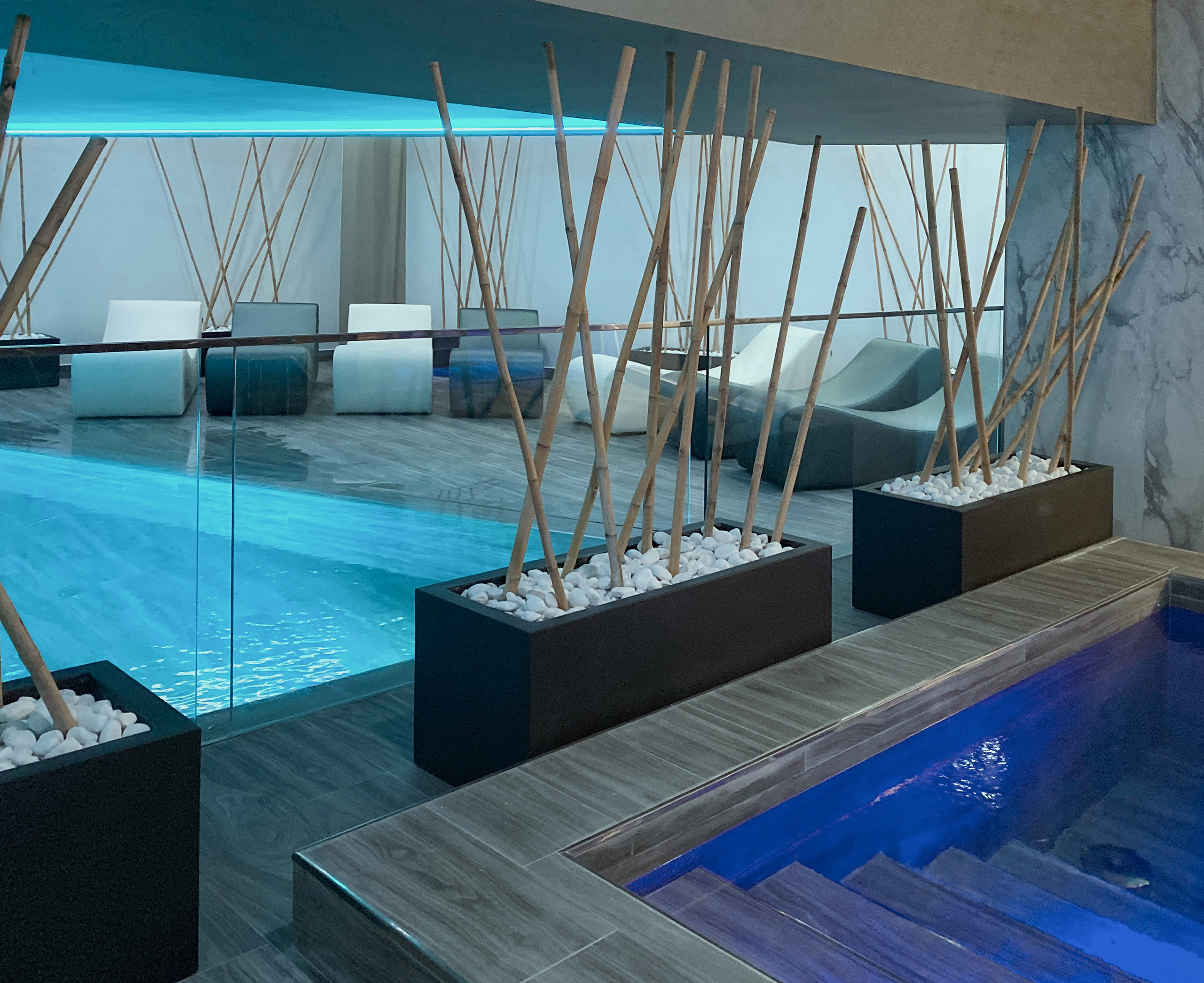 a pool with a pool and a room with a pool and a pool