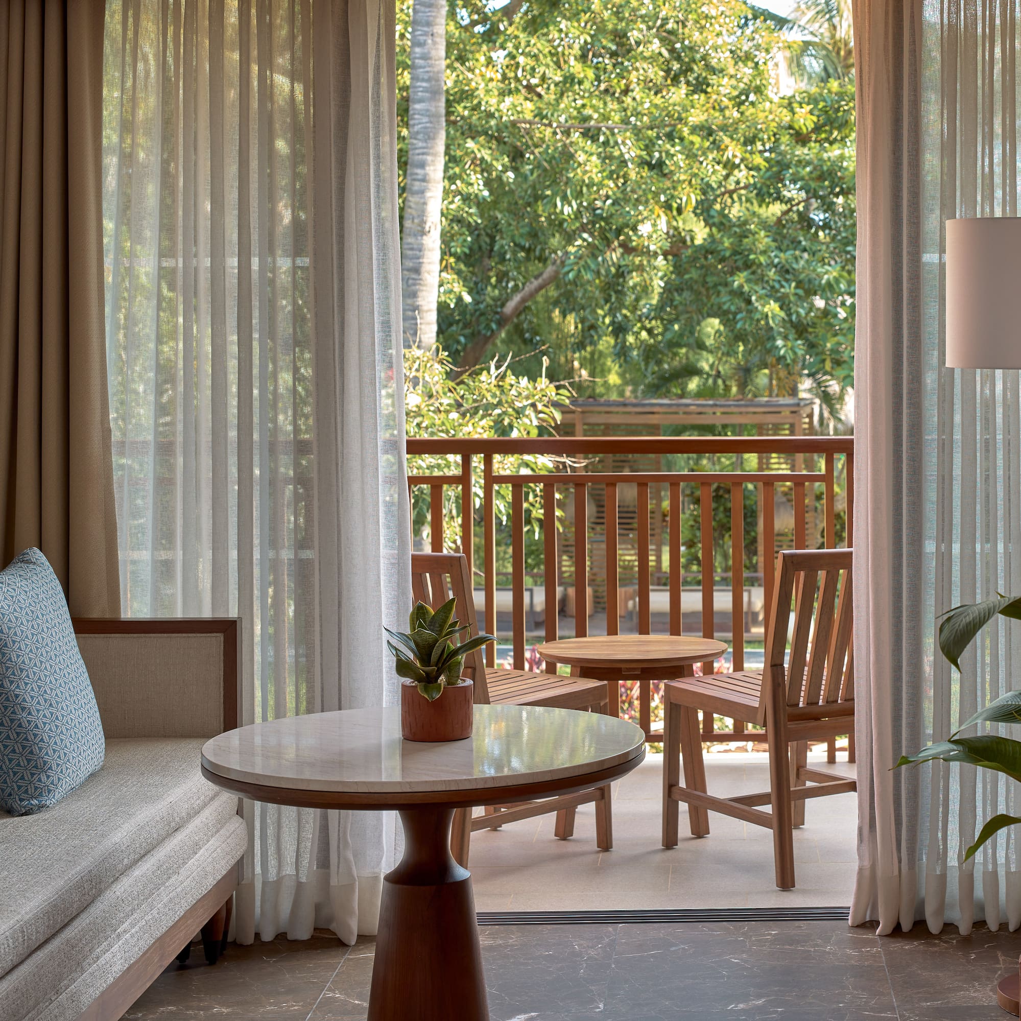 a room with a table and chairs