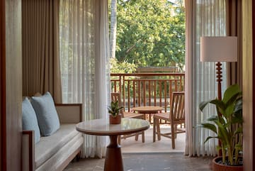 a room with a table and chairs