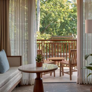 a room with a table and chairs