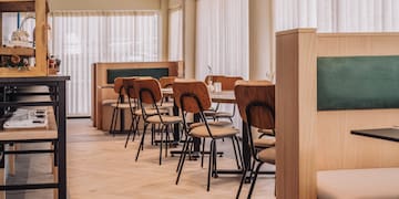 a room with tables and chairs