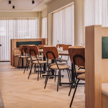 a room with tables and chairs