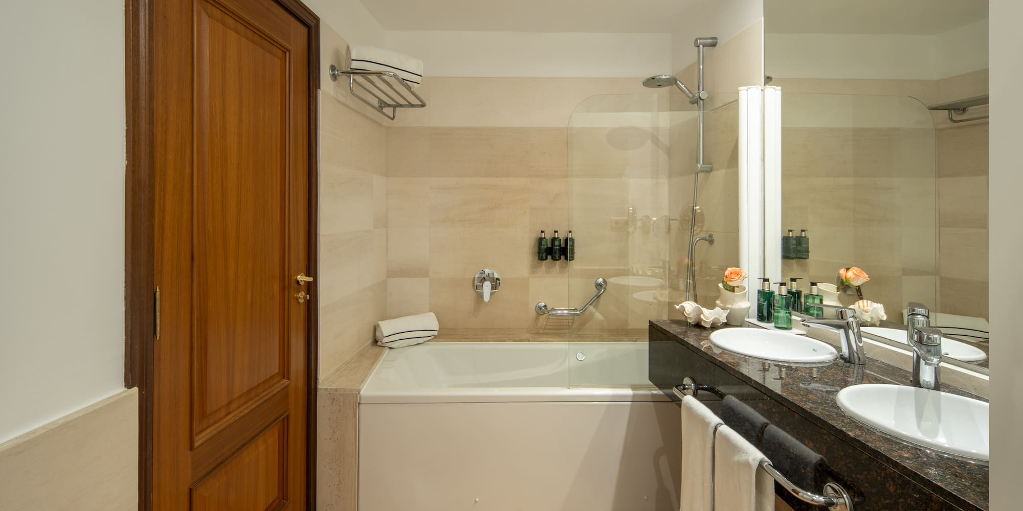 a bathroom with a bathtub and sink