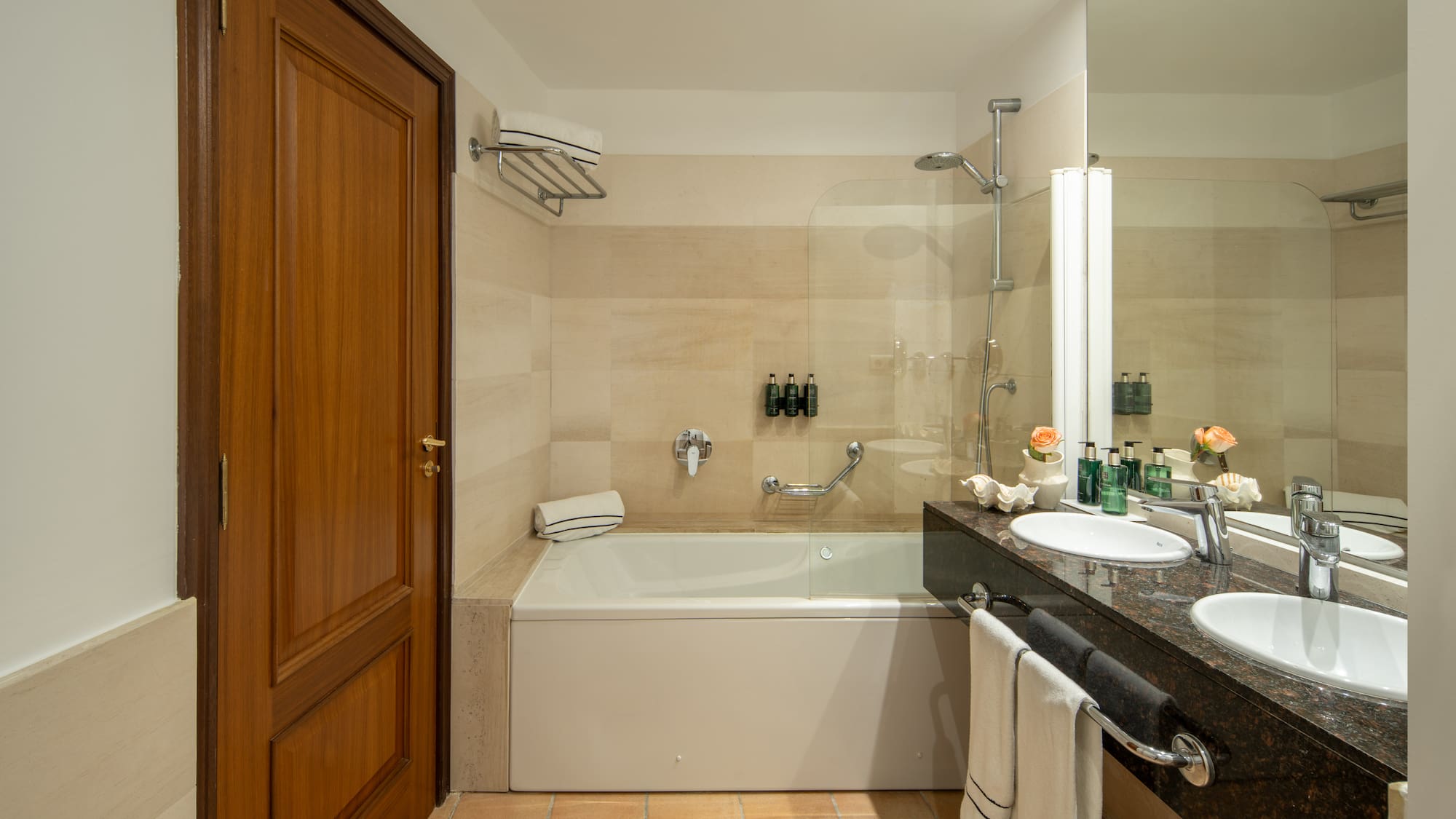 a bathroom with a bathtub and sink