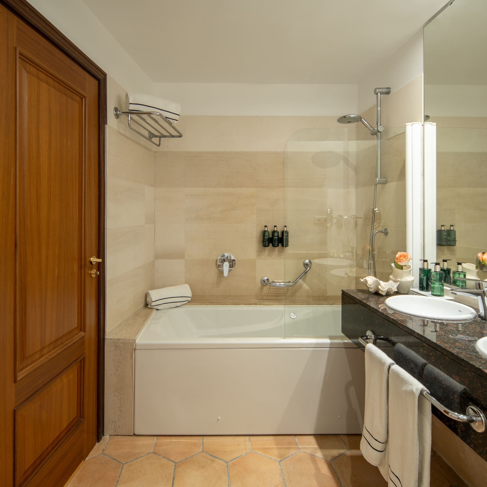 a bathroom with a bathtub and sink
