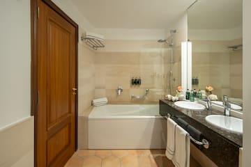 a bathroom with a bathtub and sink