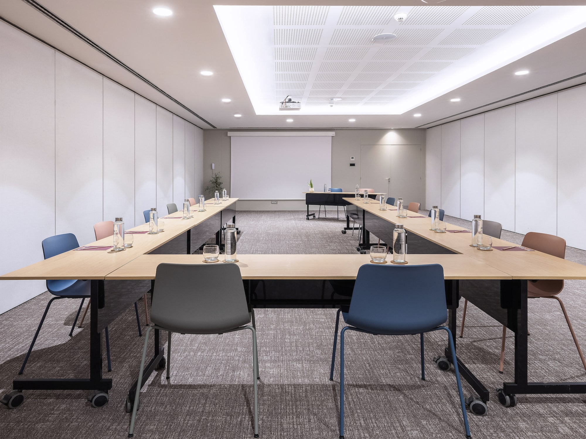 a room with tables and chairs