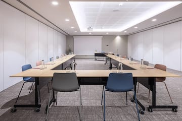 a room with tables and chairs