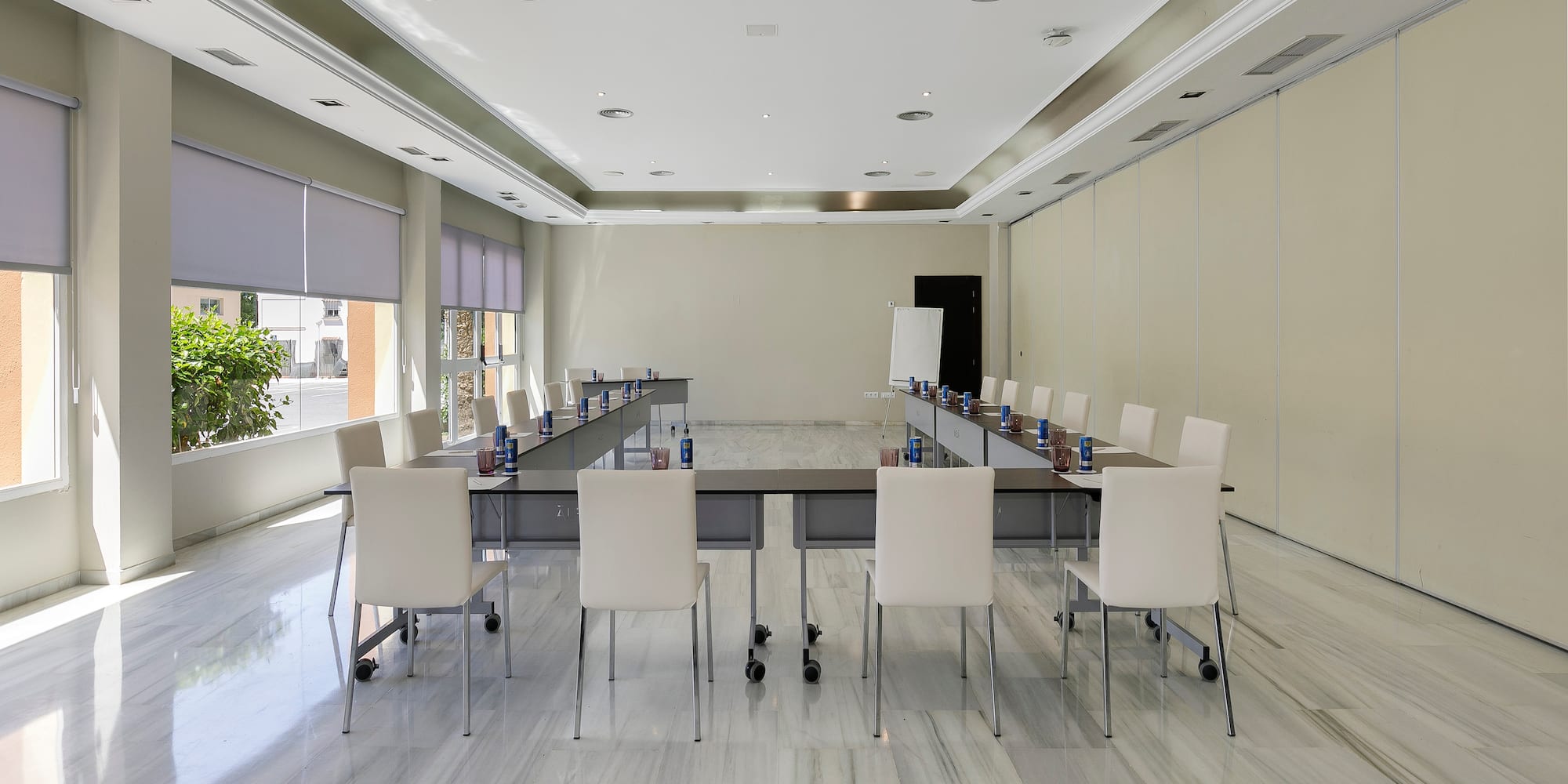 a room with a table and chairs