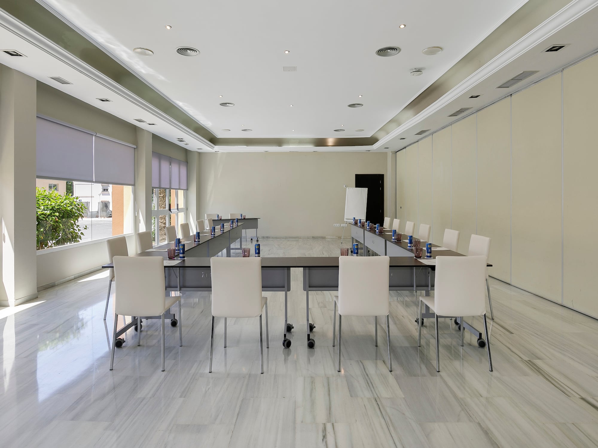 a room with a table and chairs