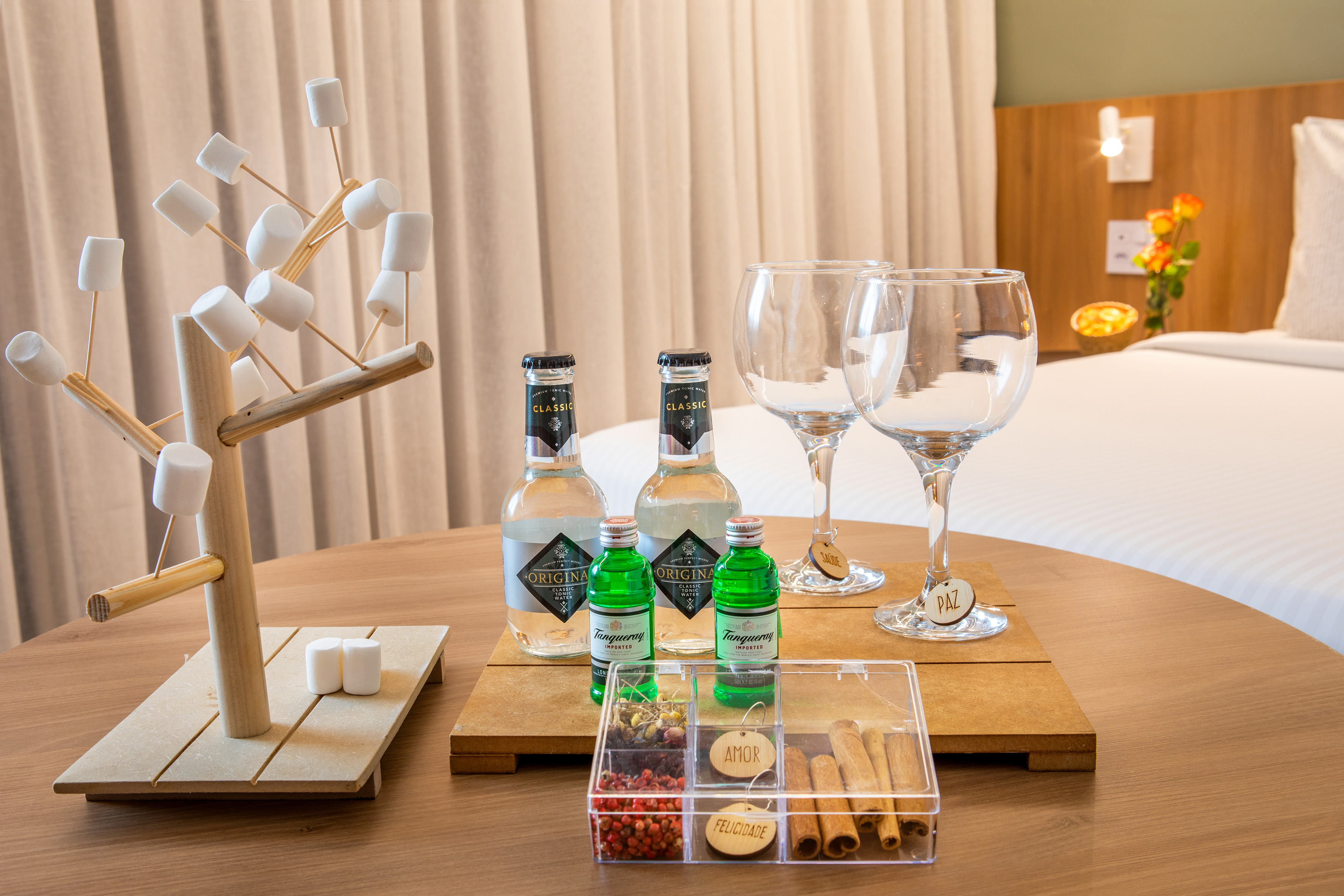 Hotel welcome amenity: Gin & Tonic kit, marshmallows, cocktail garnishes.