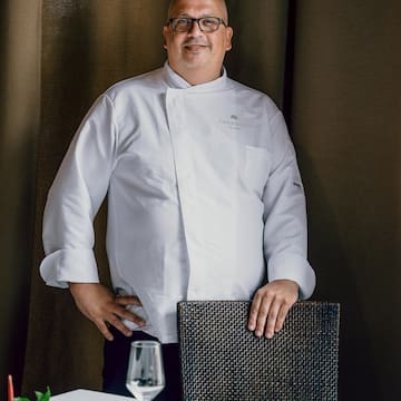 a man in a white coat