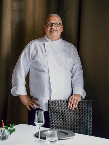 a man in a white coat