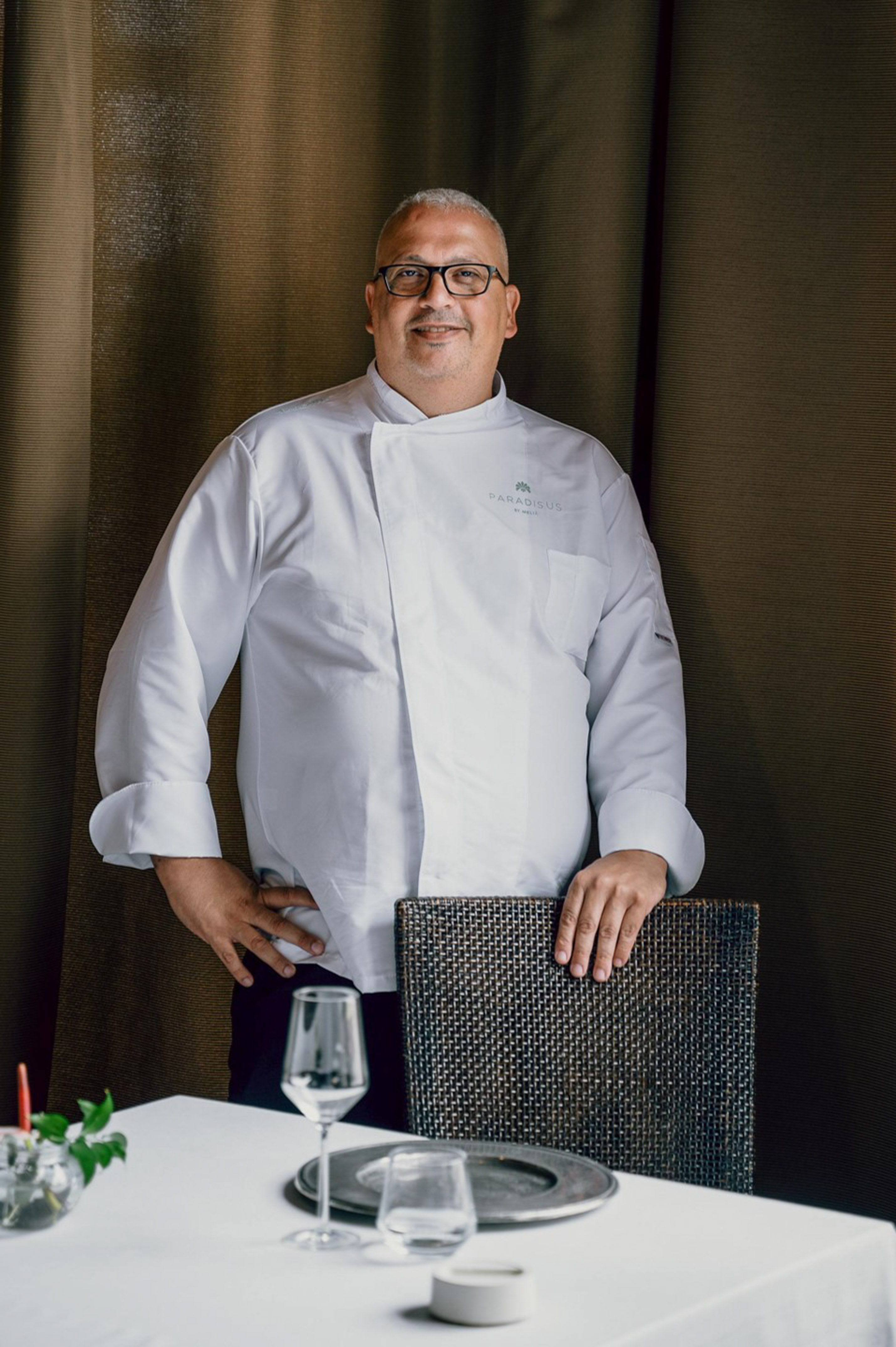 a man in a white coat