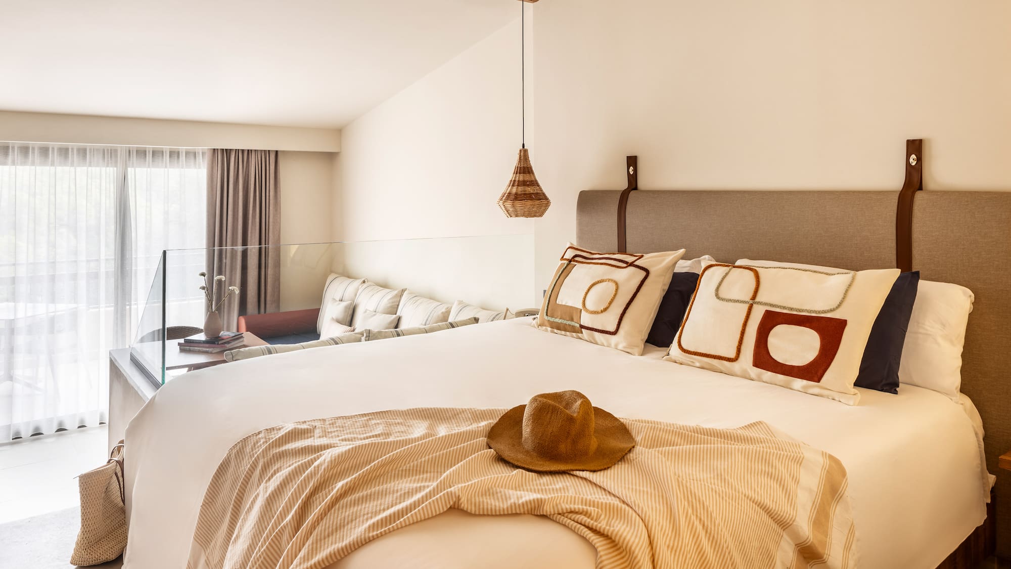 a bed with a hat on it