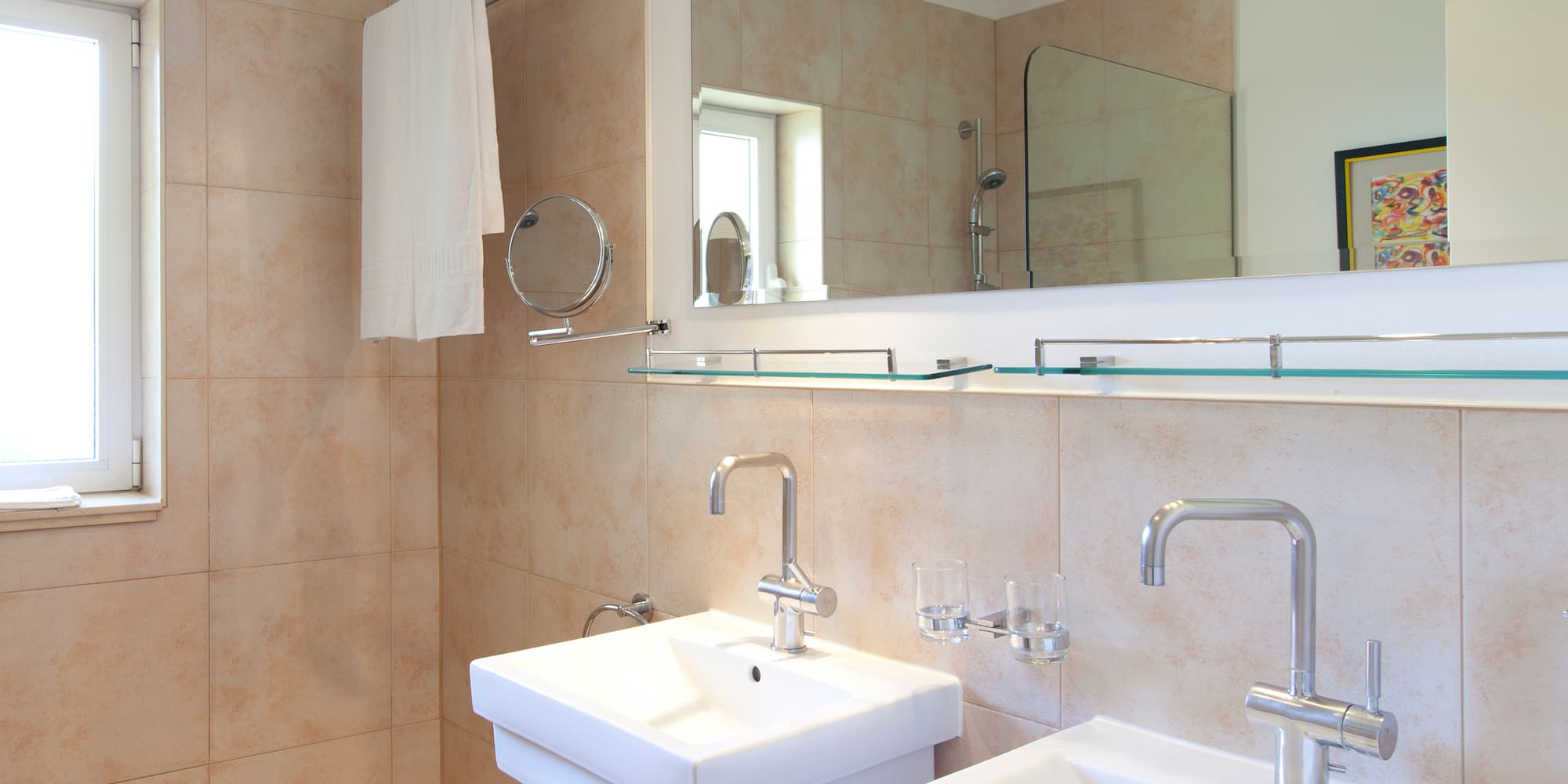 a bathroom with a mirror and sink