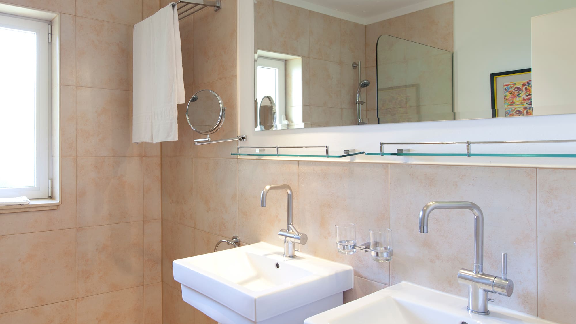 a bathroom with a mirror and sink