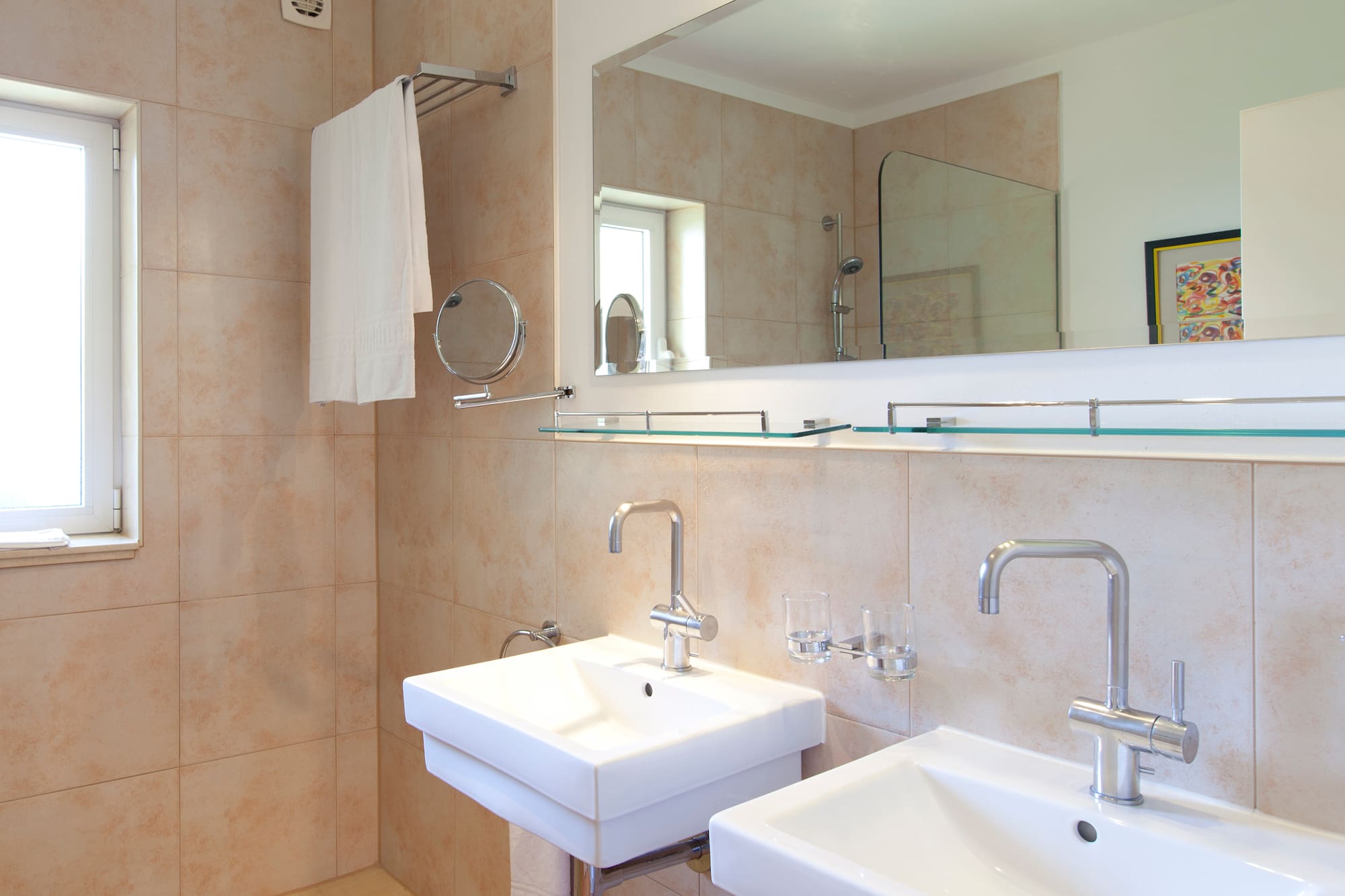 a bathroom with a mirror and sink