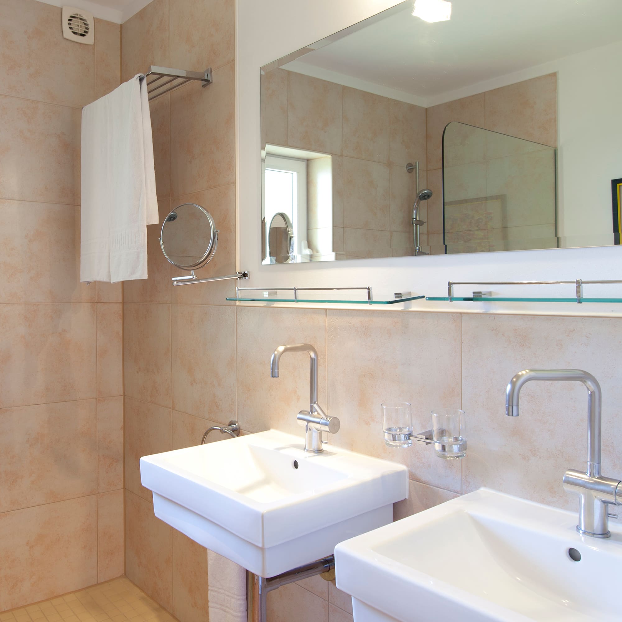a bathroom with a mirror and sink