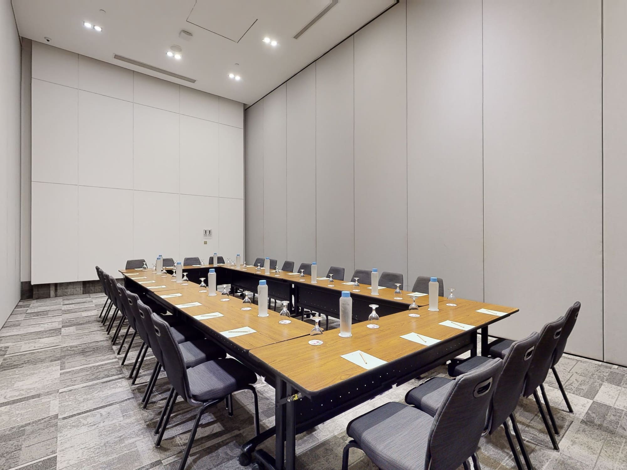 a long conference table with chairs