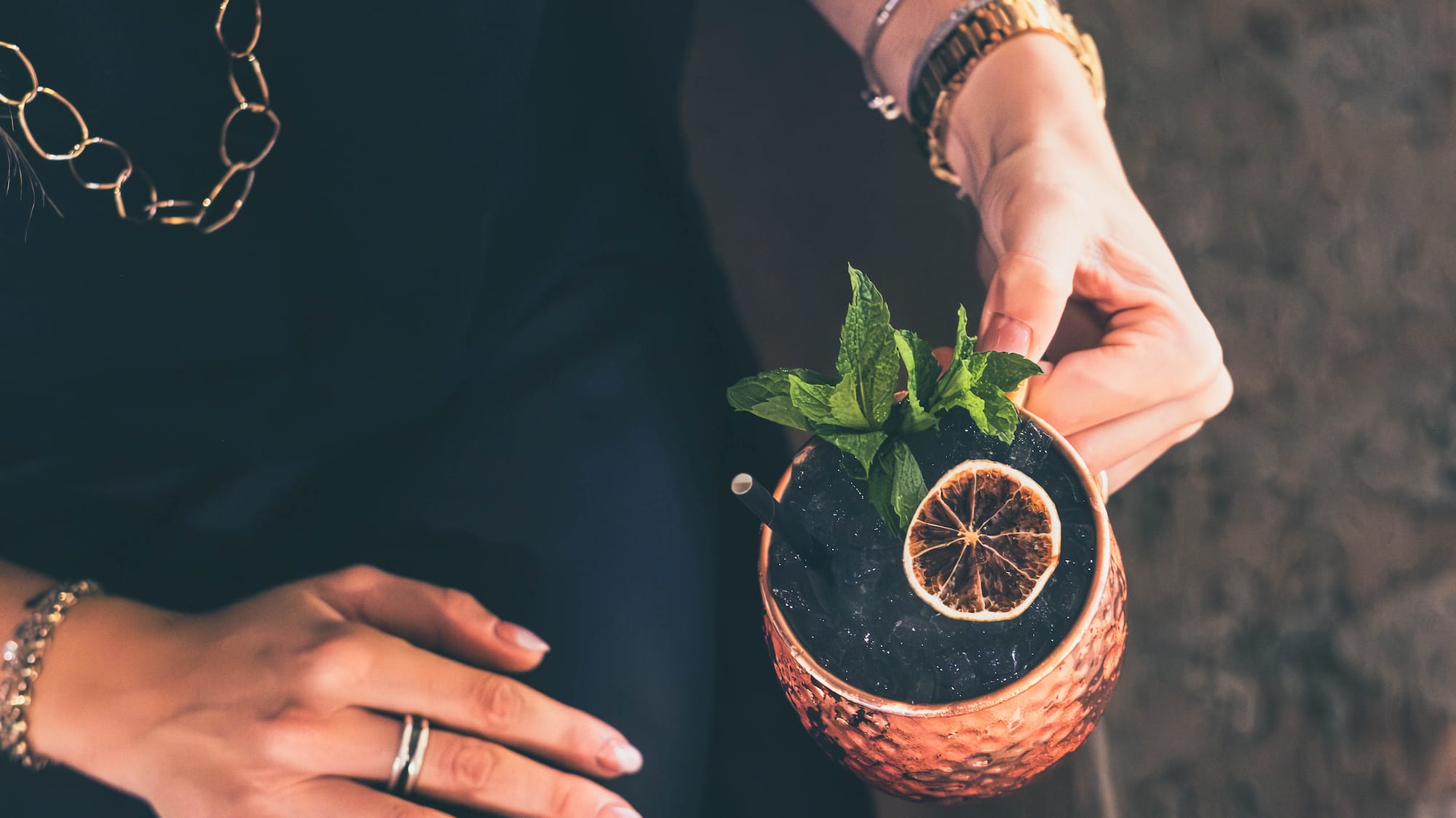 a person holding a drink