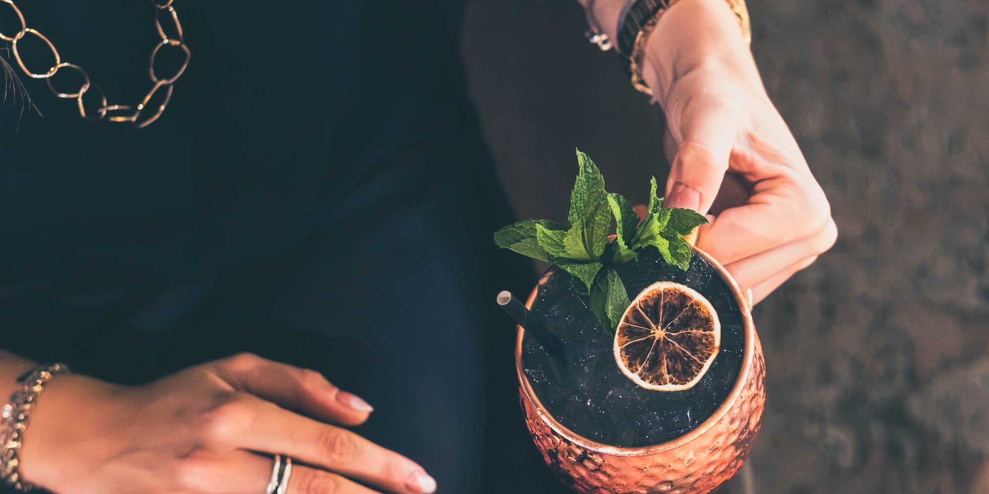 a person holding a drink