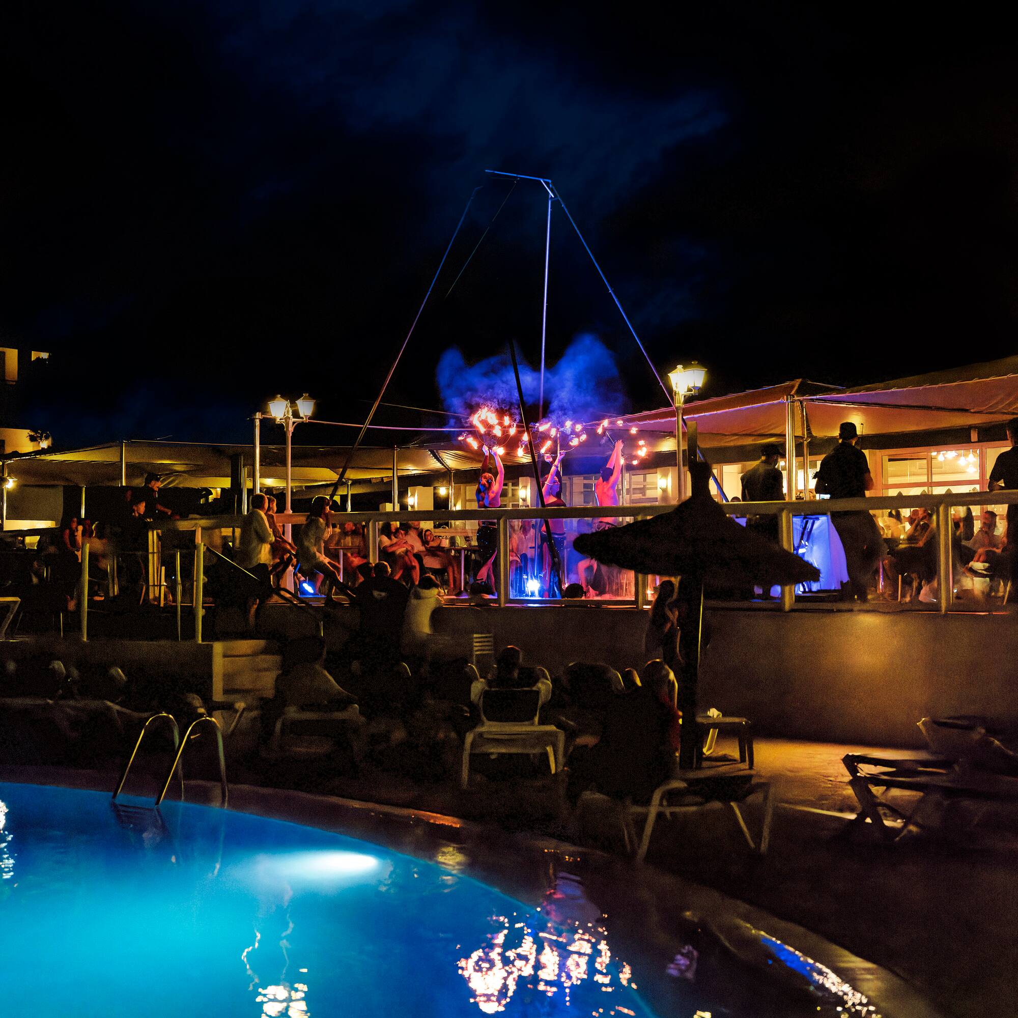 a pool with people around it