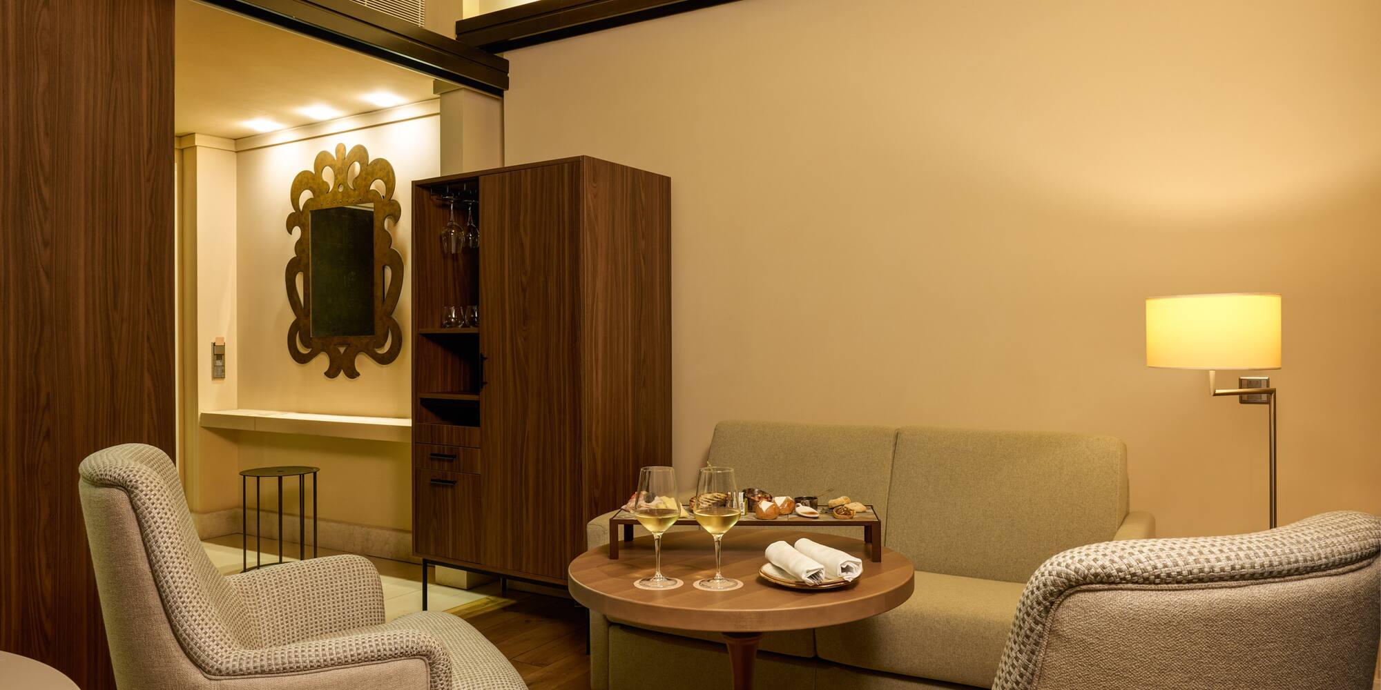 a room with a couch and a table with food on it