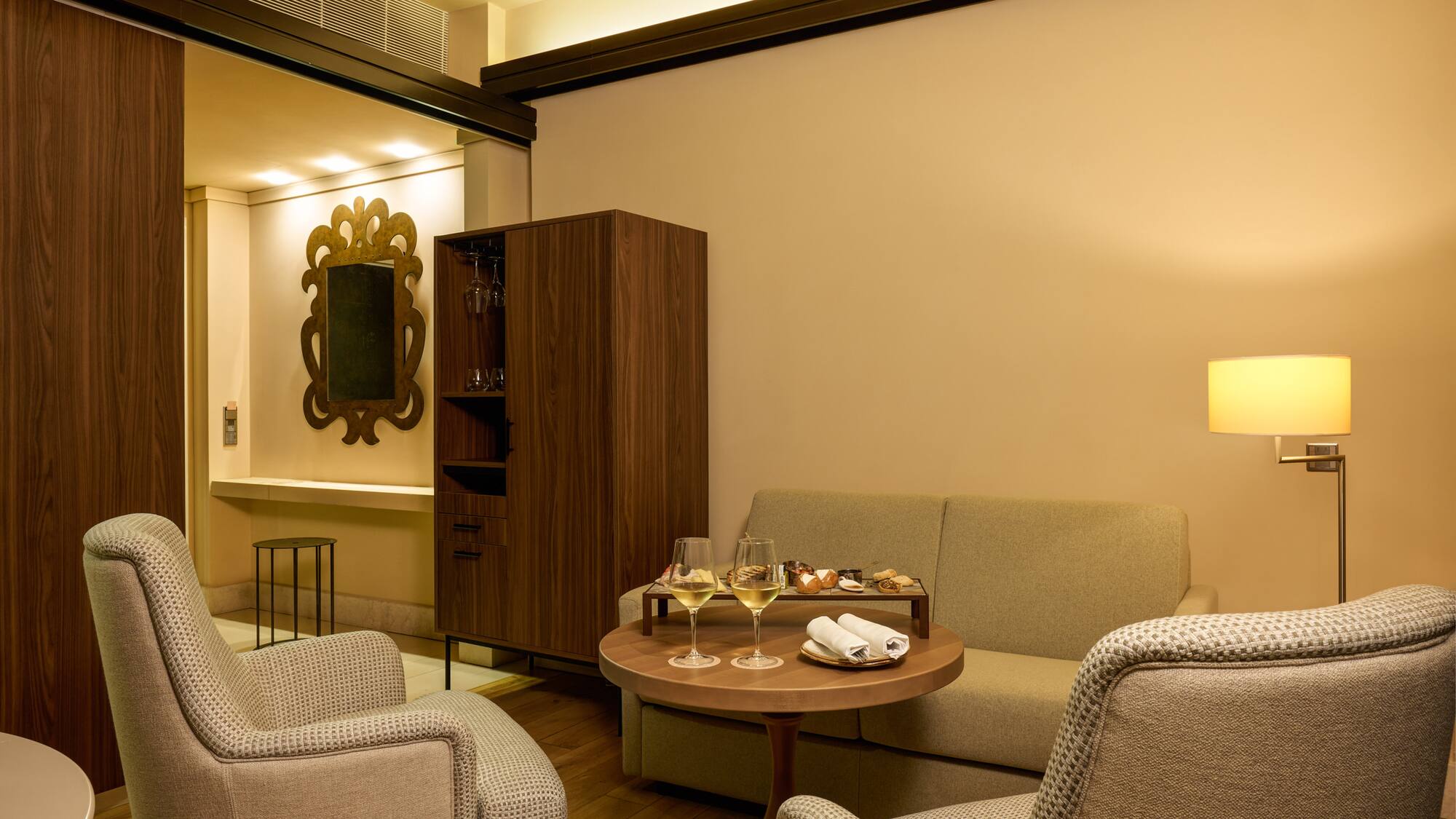 a room with a couch and a table with food on it