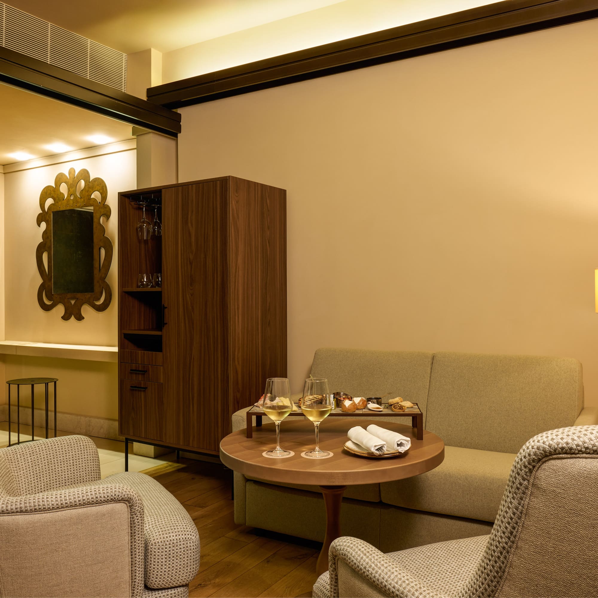 a room with a couch and a table with food on it