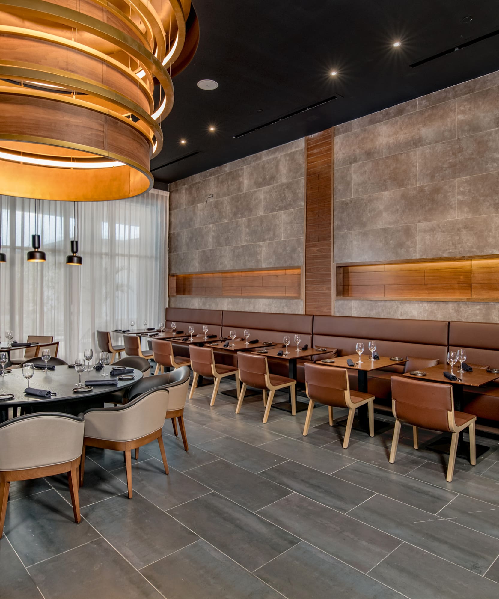 a room with a large table and chairs