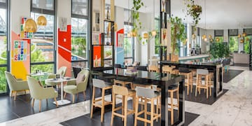 a room with tables and chairs