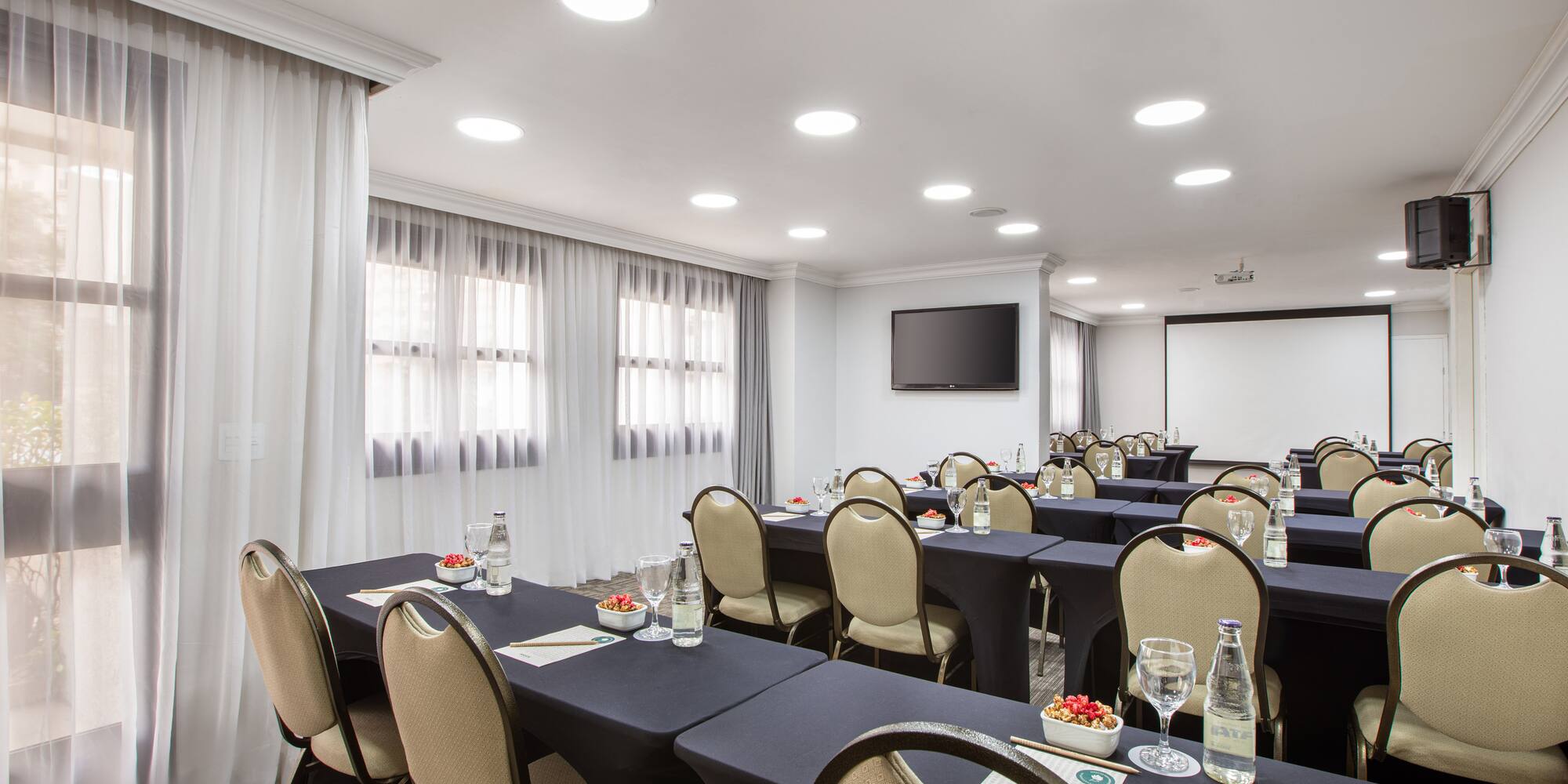 a room with tables and chairs