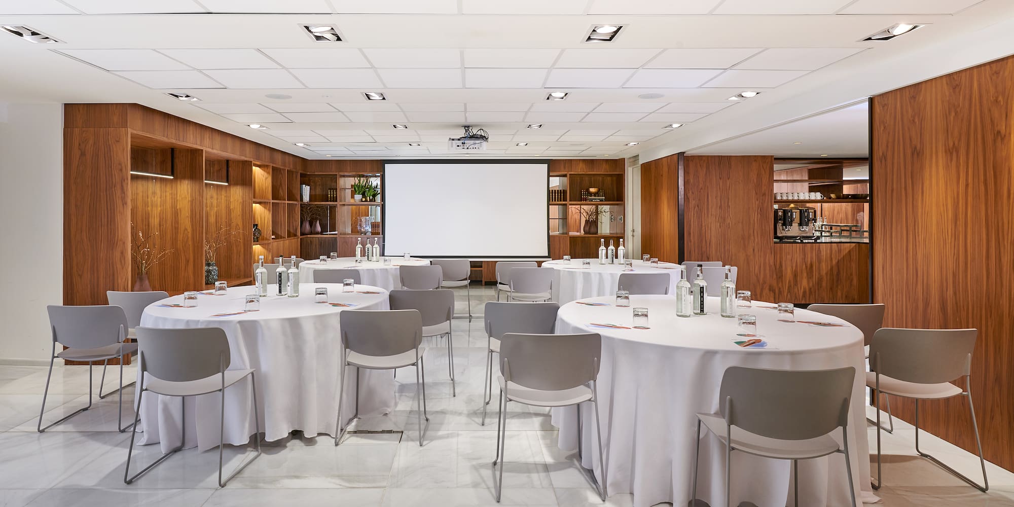 a room with tables and chairs