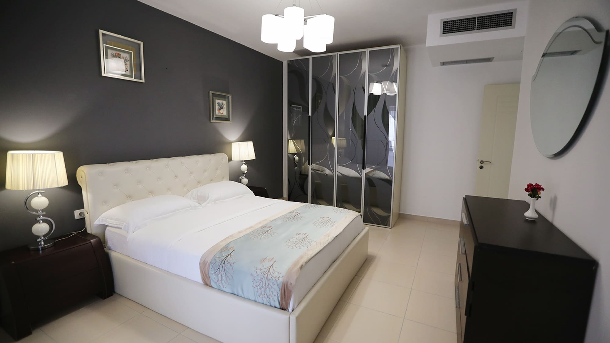 a bedroom with a bed and a closet