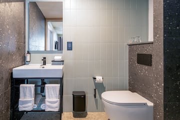 a bathroom with a sink and toilet