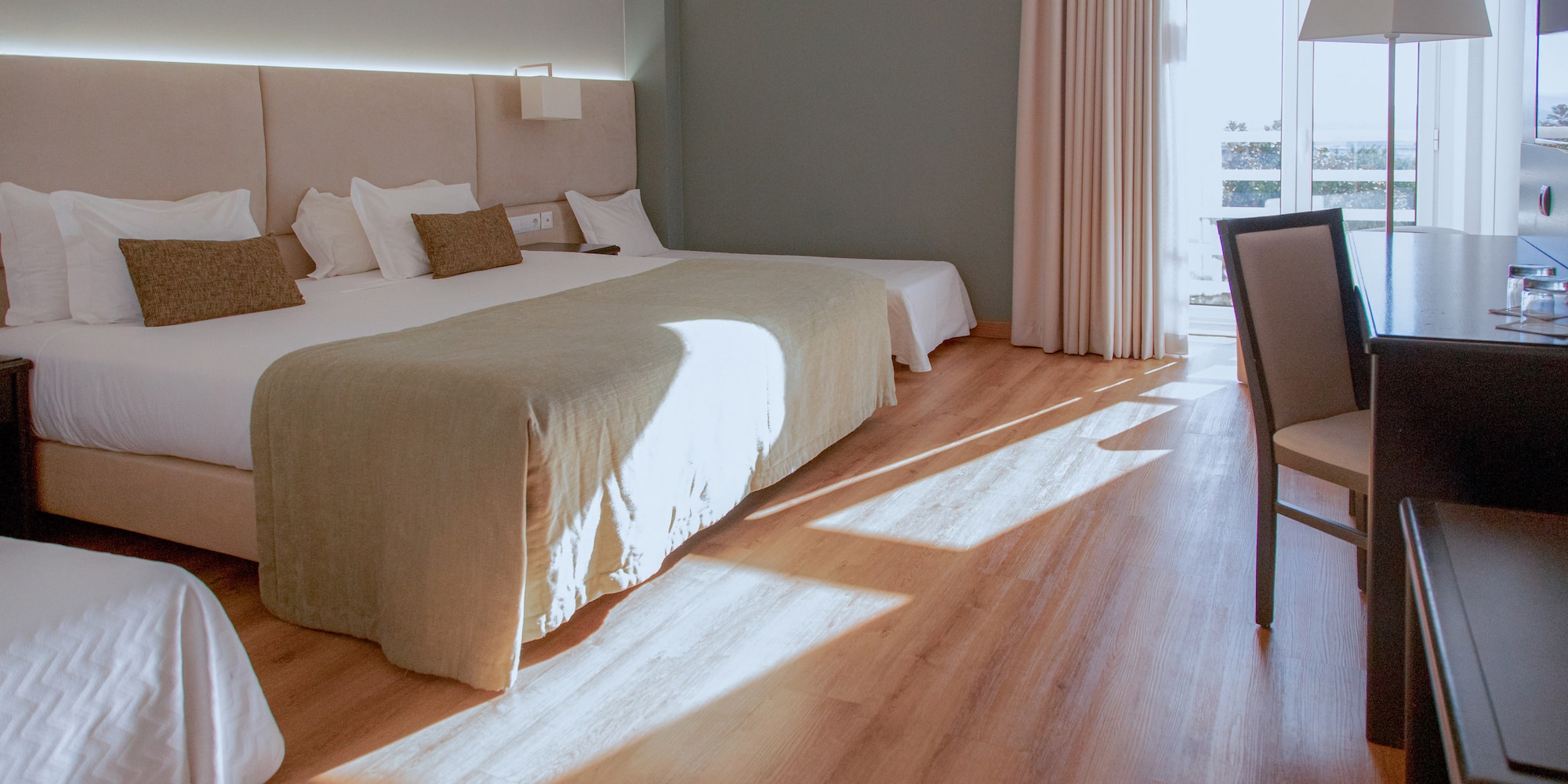 a room with a bed and a chair