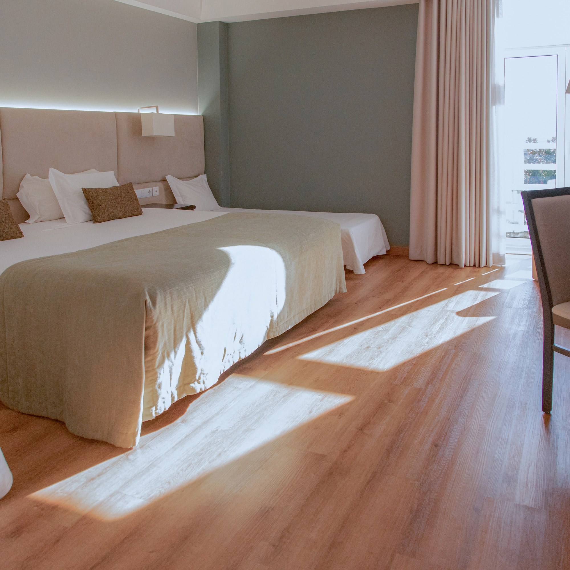 a room with a bed and a chair