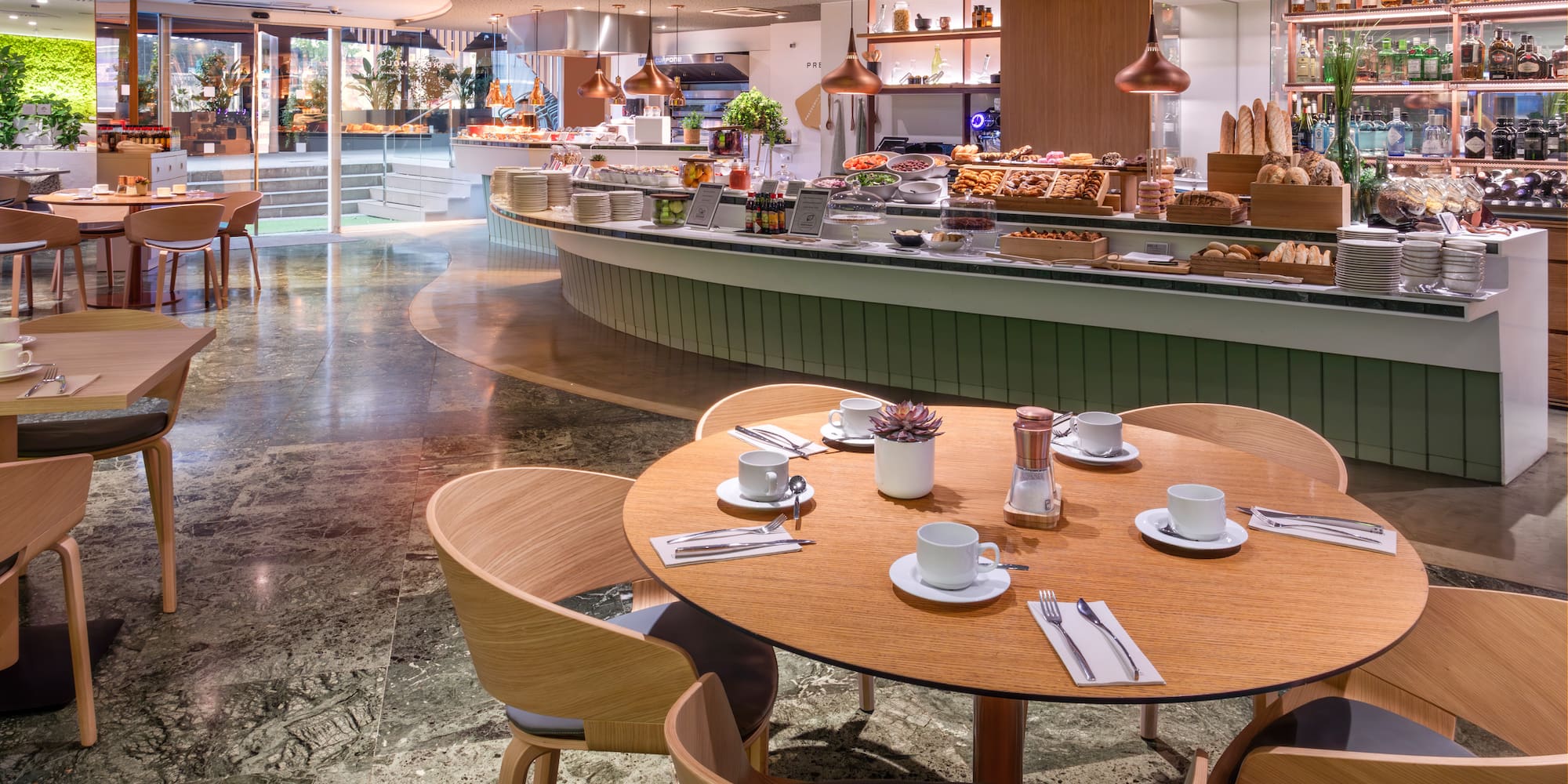 a restaurant with a counter and a large counter