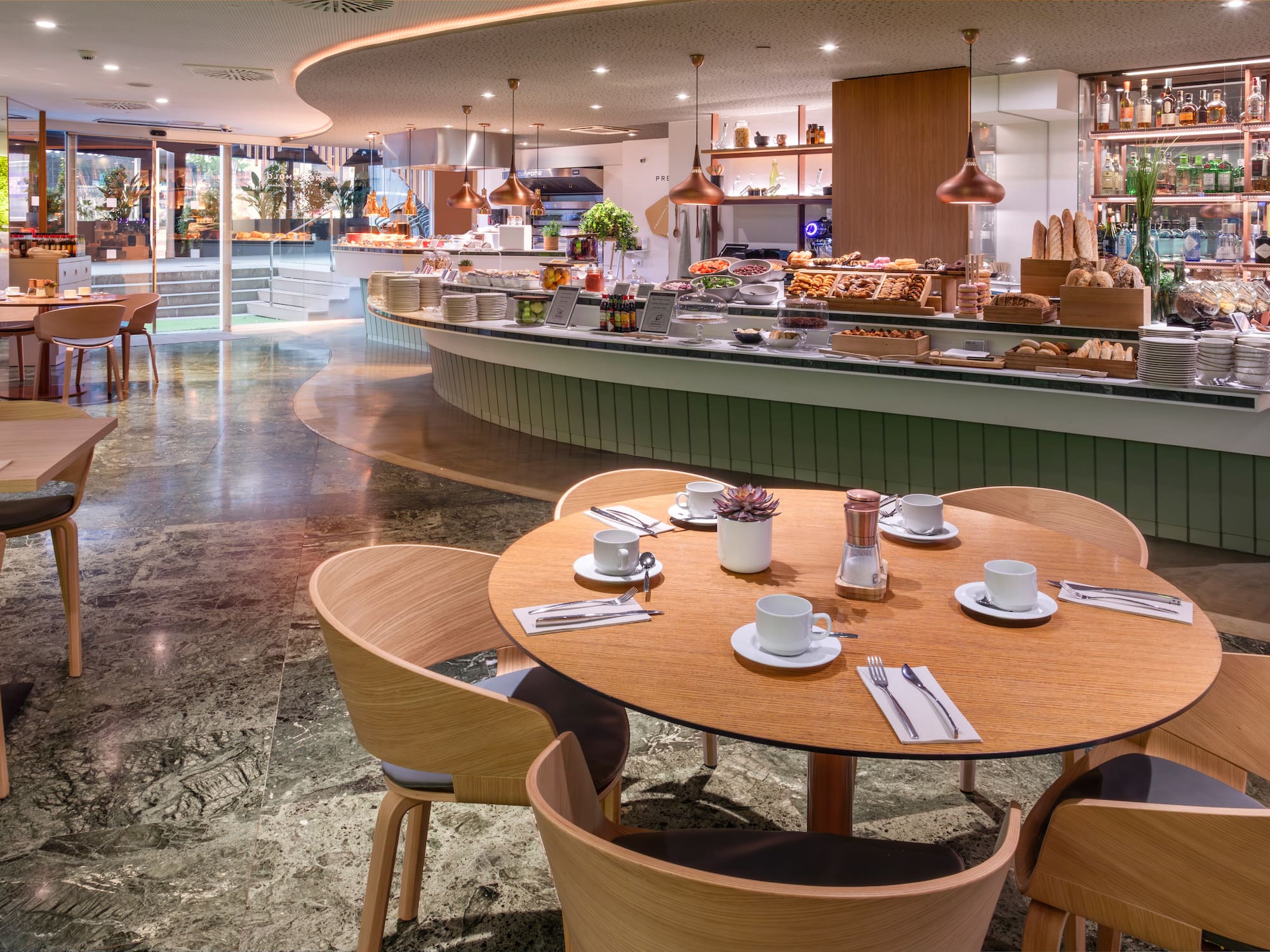 a restaurant with a counter and a large counter