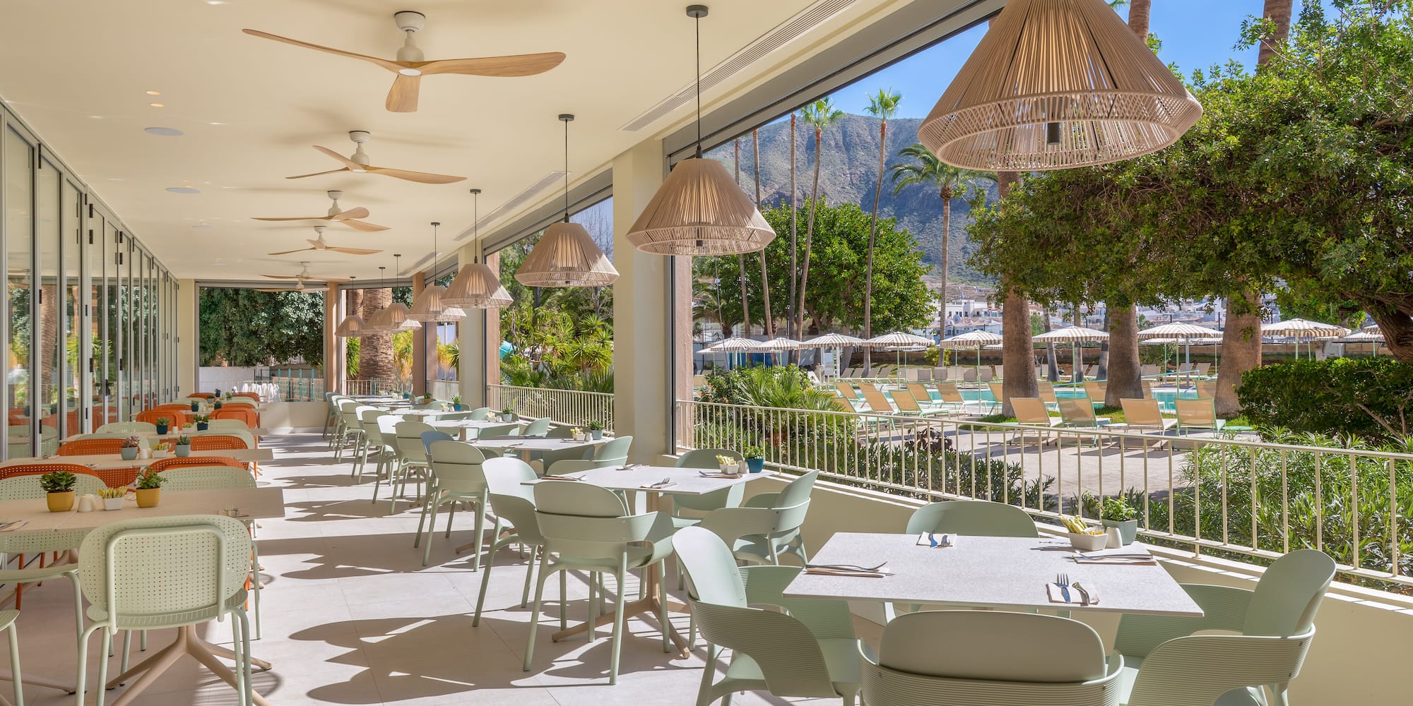 a restaurant with tables and chairs